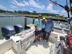 Three people fishing in Gulf Shores