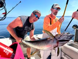 Two people fishing in the Gulf Shores