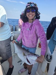 A person fishing on the shores of Gulf Shores