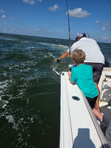 Diverse fishing techniques shine under partly cloudy Gulf Shores skies!