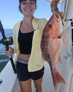Red snapper caught fishing in Gulf Shores AL on boat deck