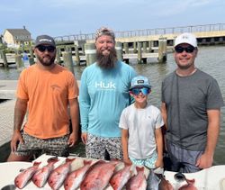 Red snapper fishing catch displayed on boat dock in Gulf Shores Alabama