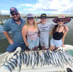 Large catch of Spanish Mackerel displayed on boat deck in Gulf Shores AL