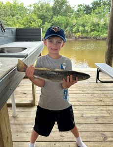 Eli with his 3 lbs speckled trout. 