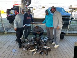 5 people enjoying a fishing tour in LA