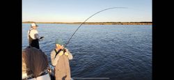 Two people enjoying a fishing tour in Hopedale