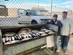 Two people enjoying a fishing tour in Hopedale