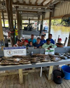 10 people enjoy fishing and tours in Hopedale