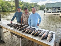 Three people on a fishing tour in Hopedale