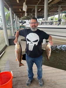 Angler with 2 redfish caught in LA