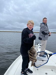 A sheepshead fish caught during a fishing tour in Hopedale