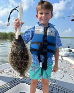 Image of a summer flounder fish caught in LA, fishing tour