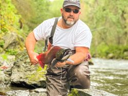 One happy angler fishing in Alaska