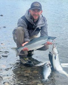 A person fishing in Kenai with a catch