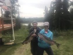 2 large fish caught while fishing in Alaska