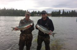 Two anglers fishing for big trout in Kenai, Alaska