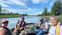 Five people fishing in Alaska