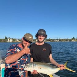 A Crevalle Jack fish caught by two people in Maine