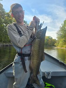 Fresh air, calm waters, and tight lines.
