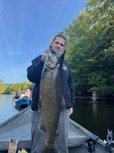 Angler catches a rainbow trout in NY