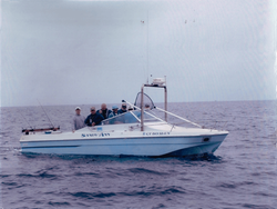 Four people enjoying fishing in CA