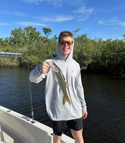 Angler with 14-inch fish in Sarasota, Florida