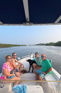Four people enjoying a great fishing trip in Sarasota