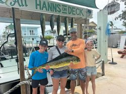Four anglers with a successful fishing trip in Key Largo