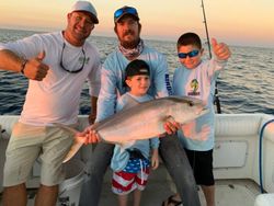 4 people fishing in the beautiful waters of Key Largo