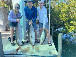 Three anglers fishing in the beautiful waters of Key Largo