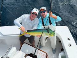 2 anglers with a big fish in Palm Beach