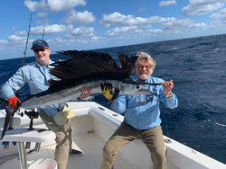 A person fishing for an Atlantic Sailfish in FL
