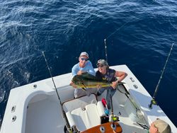 Two anglers with a big 21-inch fish in FL