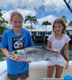 Two anglers fishing in FL with a single catch