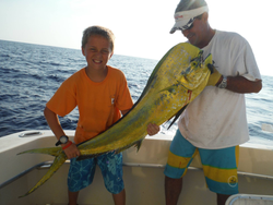 Two anglers enjoying a fishing trip at Palm Beach