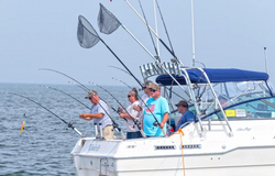 Three people enjoying a fishing trip in Linwood