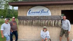 Four people fishing in MI