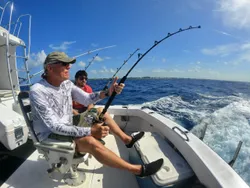 4 people in the Cayman Islands fishing
