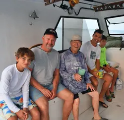 5 people fishing in Cayman Islands