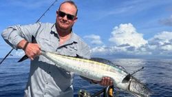 Wahoo fish caught by a person in the Cayman Islands