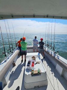 Two people fishing at Port Clinton