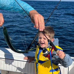 Photograph of a 14-inch American Eel caught while fishing in NJ