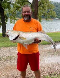 Angler holding a big 24-inch fish in Arkansas