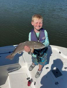 A redfish measuring 20 inches caught while fishing in Bluffton