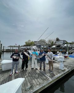 Group of 6 people fishing at Point Pleasant