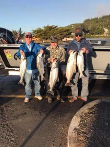 Three anglers enjoy a fishing trip in OR