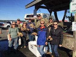 Group of 8 people enjoying outdoor activity in North Bend