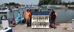 Six people enjoying a fishing trip at Lakeside Marblehead