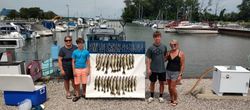 4 people enjoying a fishing trip at Lakeside Marblehead