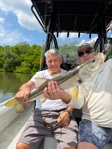 Two anglers enjoying a fishing trip in FL